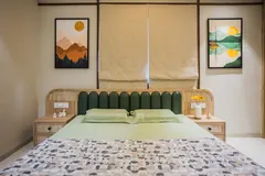 Bedroom with cane headboard