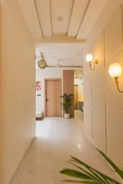 Corridor with brass sconces